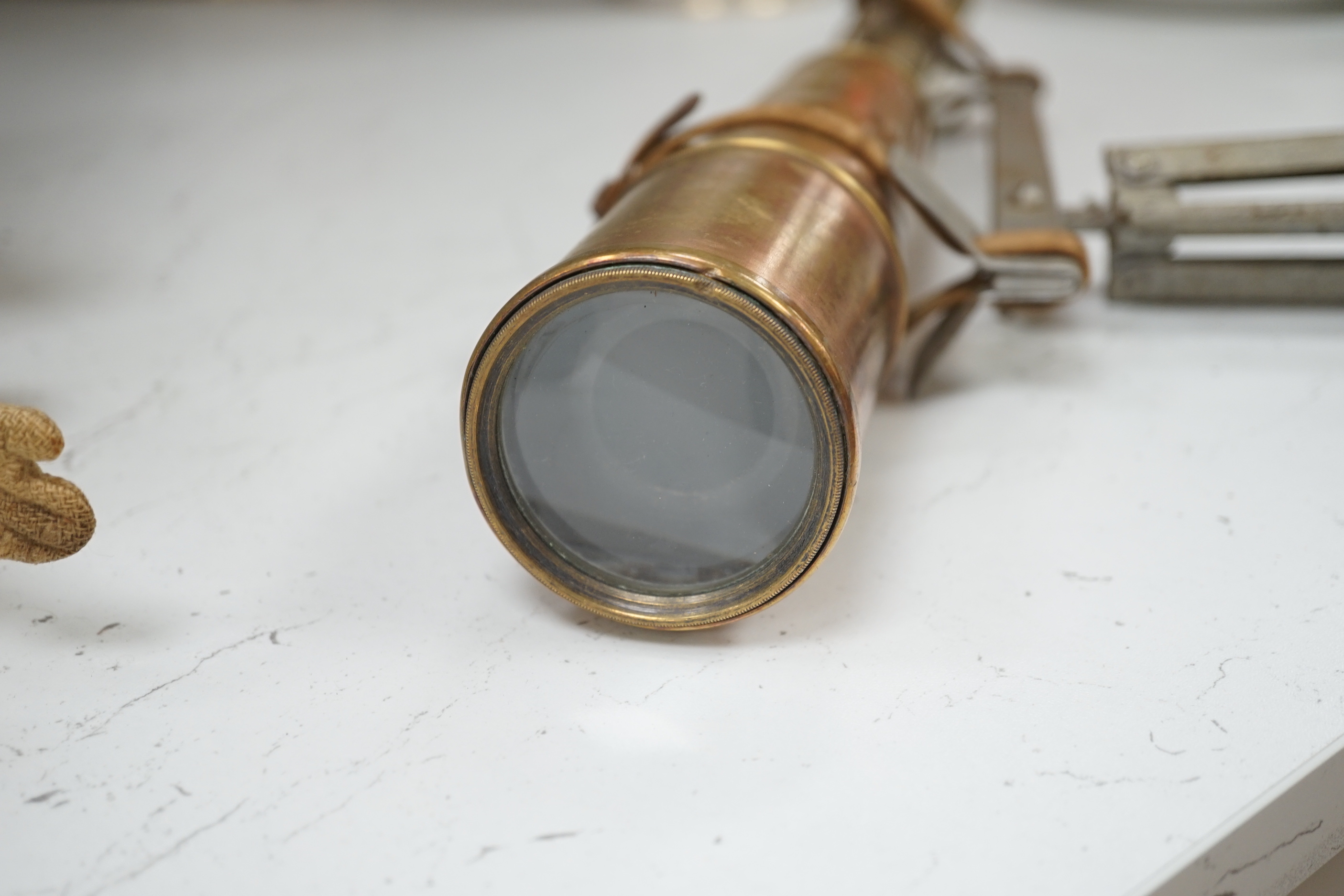 A brass single draw telescope, cased opera glasses, a pair of plated candlesticks, etc.